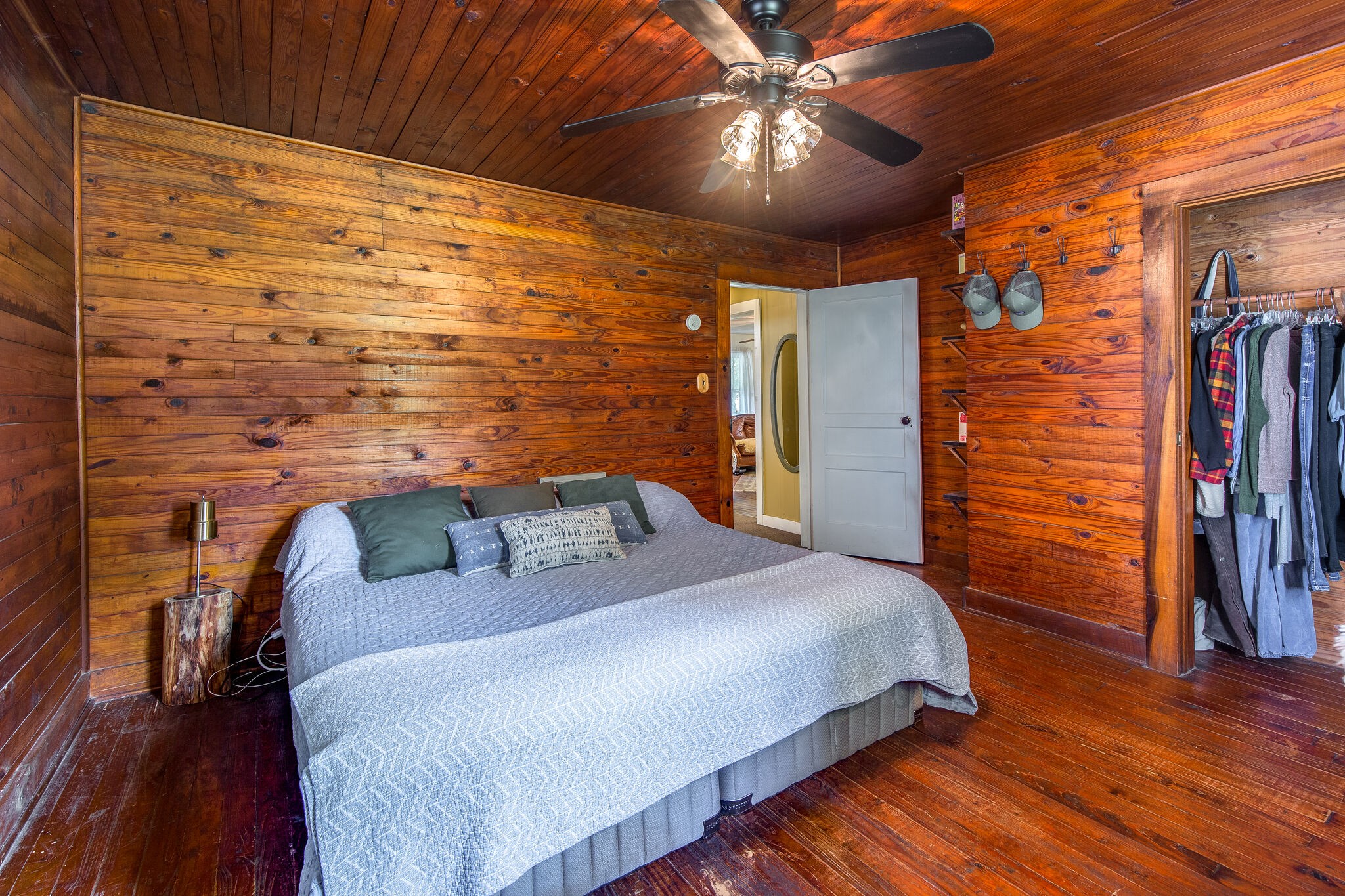 10221 Ed Lyell Road Lyles, TN 37098 - Photo 15 of 27 a bedroom with a bed and wooden floor