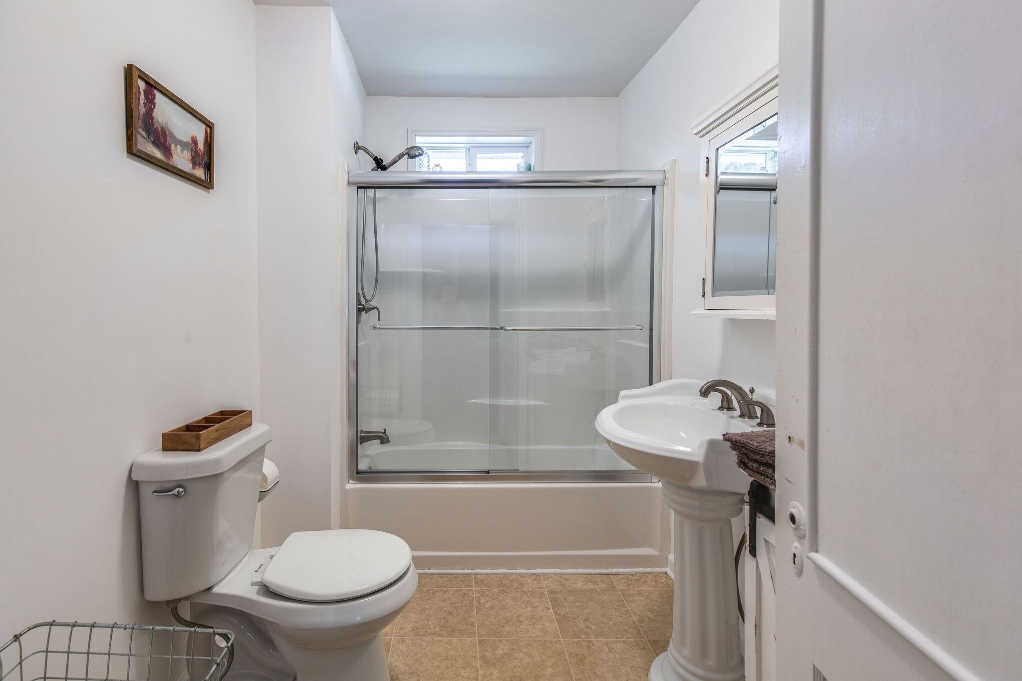 10221 Ed Lyell Road Lyles, TN 37098 - Photo 17 of 27 a bathroom with a toilet and a shower
