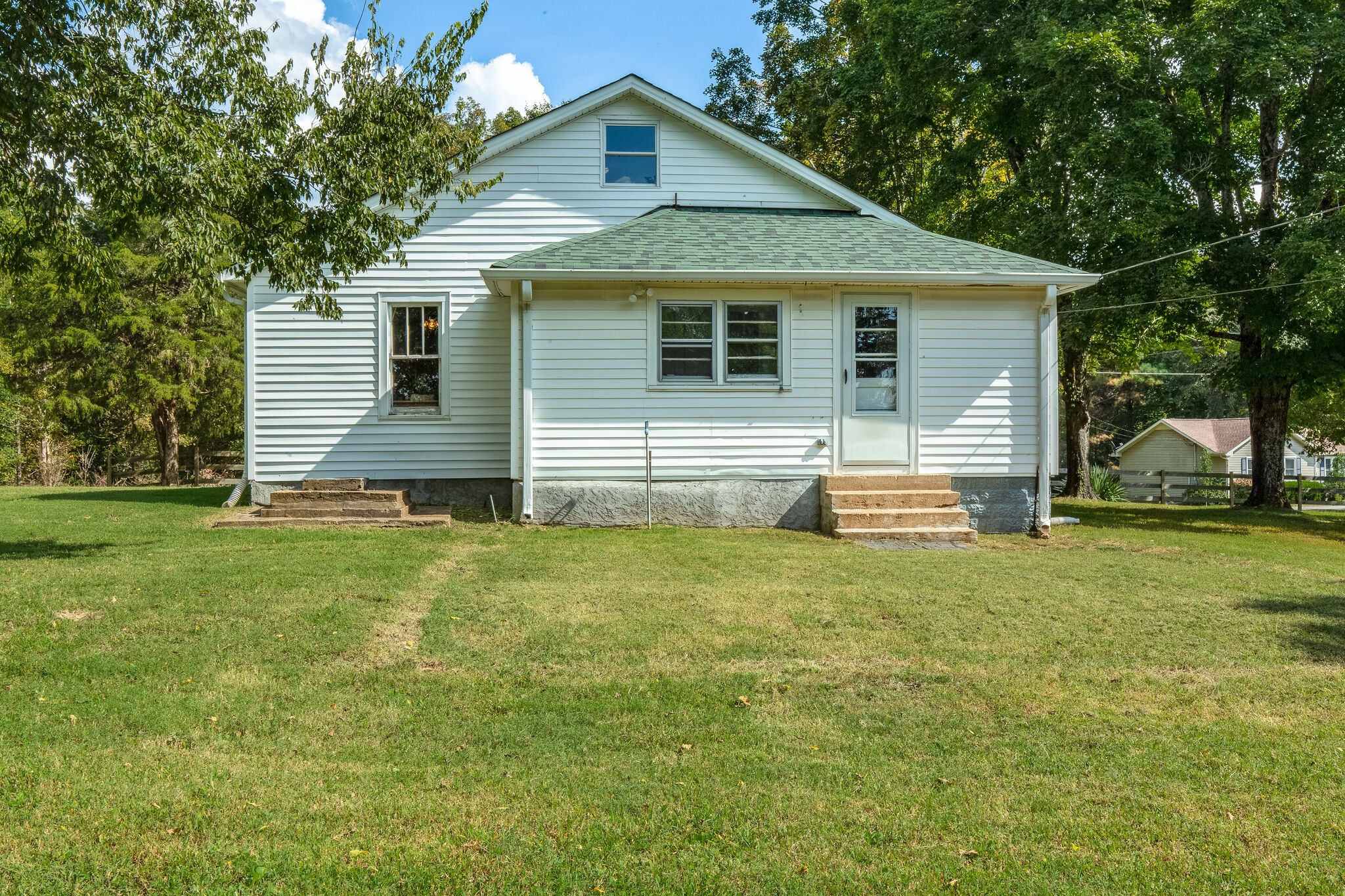 10221 Ed Lyell Road Lyles, TN 37098 - Photo 27 of 27 a view of a house with a yard