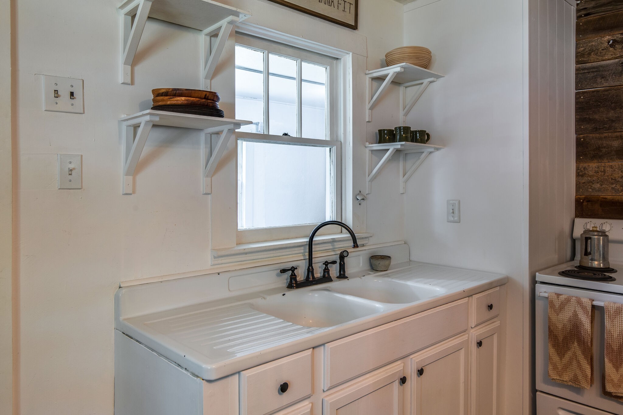 10221 Ed Lyell Road Lyles, TN 37098 - Photo 9 of 27 a bathroom with a sink and a mirror