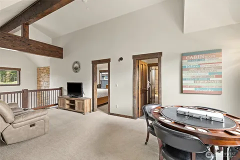 a dining room with furniture and window