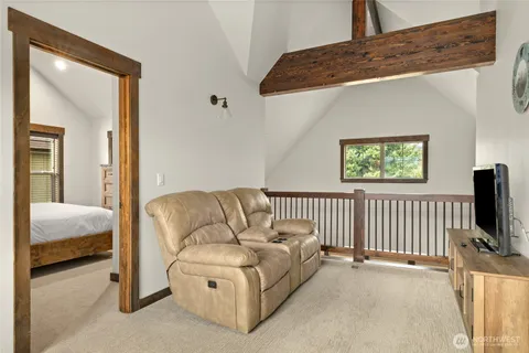 a bathroom with a double vanity sink a mirror and a bathtub