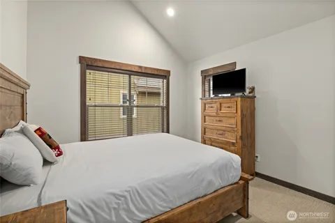a bathroom with a sink toilet and mirror