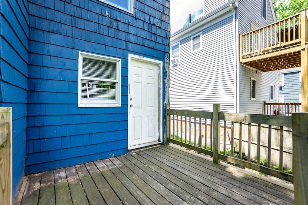 9 Barton Street Salem, MA 01970 - Photo 19 of 26 a view of a house with wooden floor