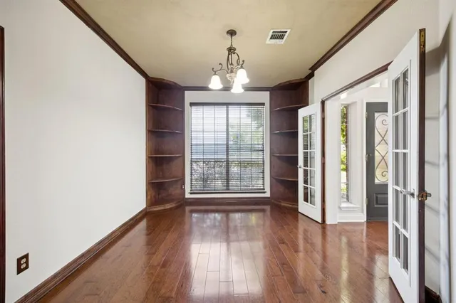 a view of entryway with wooden floor