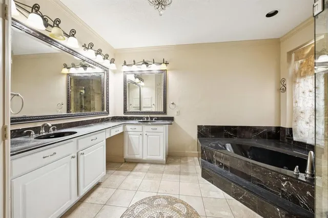 a kitchen with stainless steel appliances granite countertop a stove and a sink