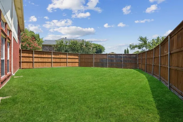 a view of a backyard with a garden