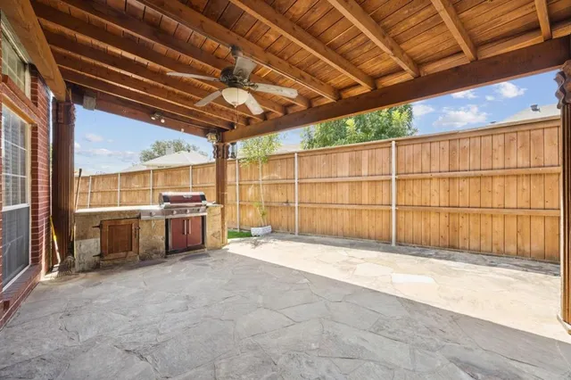 a view of a garage with wooden wall