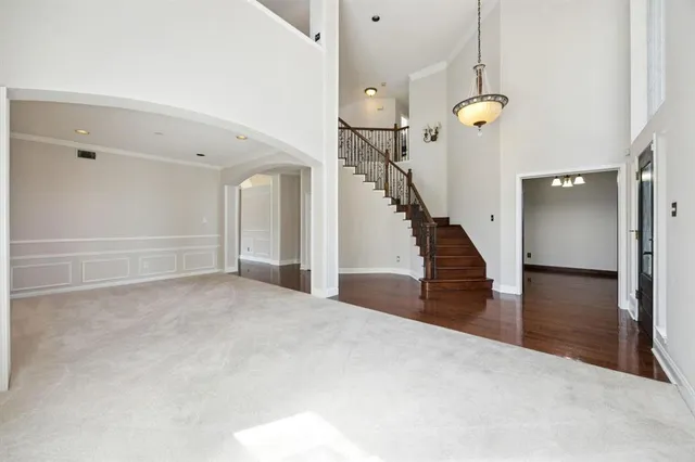 a view of a hallway view with staircase