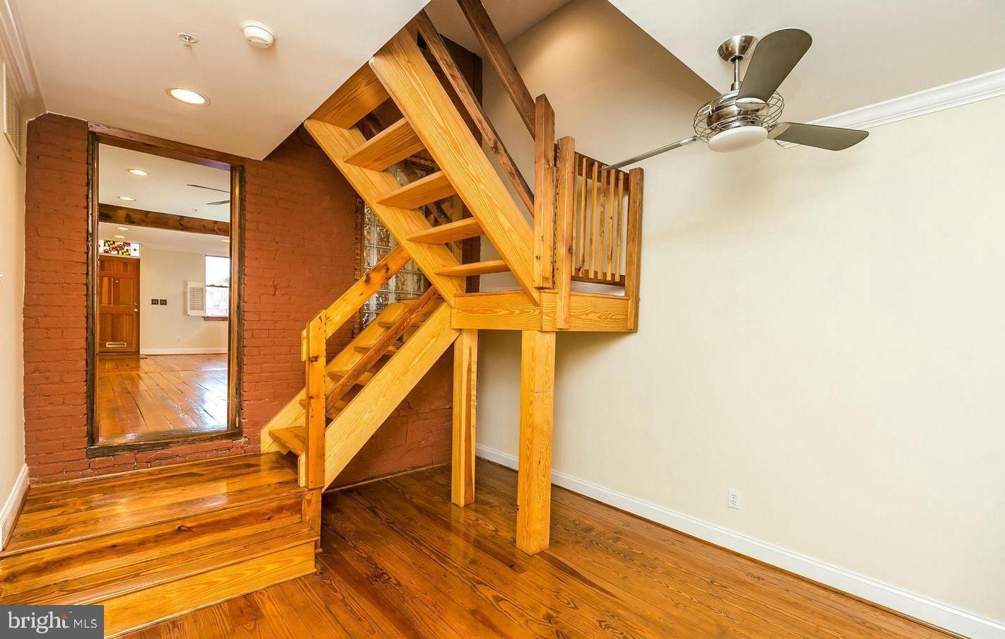 1244 Riverside Avenue Baltimore, MD 21230 - Photo 14 of 30 Reclaimed wood railings & flooded w/natural light