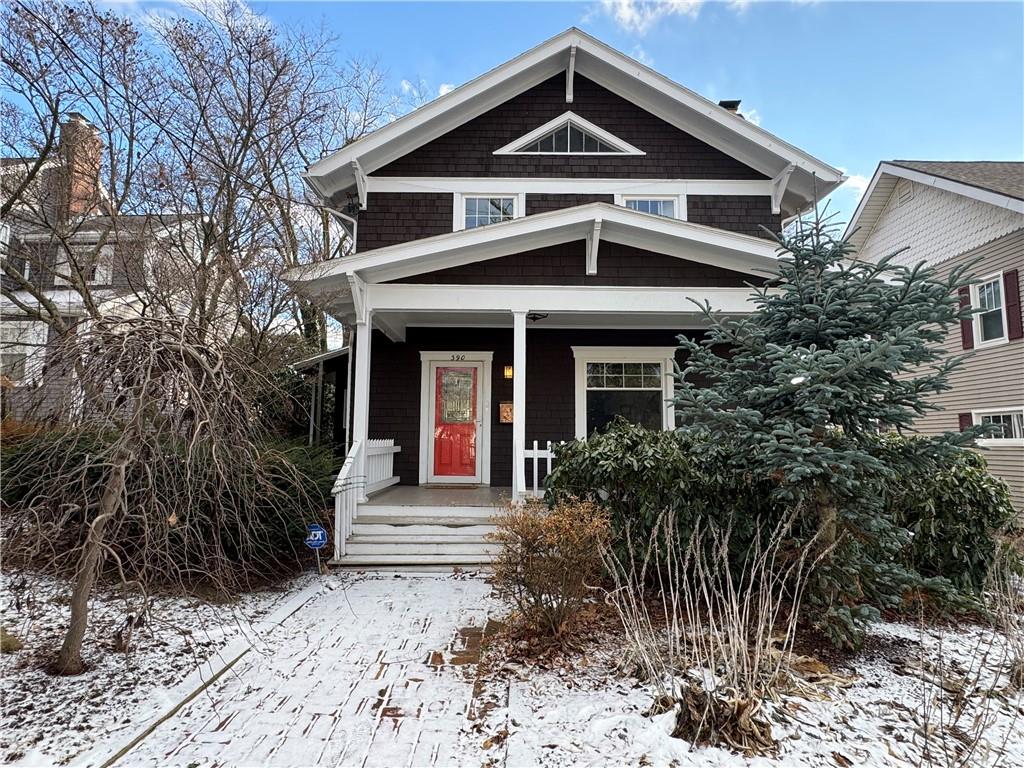 390 Locust Street Indiana, PA 15701 - Photo 1 of 21 a front view of a house with a yard