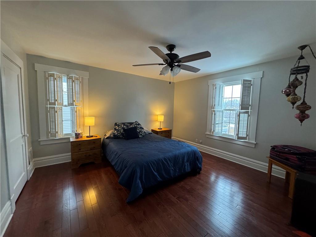 390 Locust Street Indiana, PA 15701 - Photo 15 of 21 a spacious bedroom with a bed and wooden floor