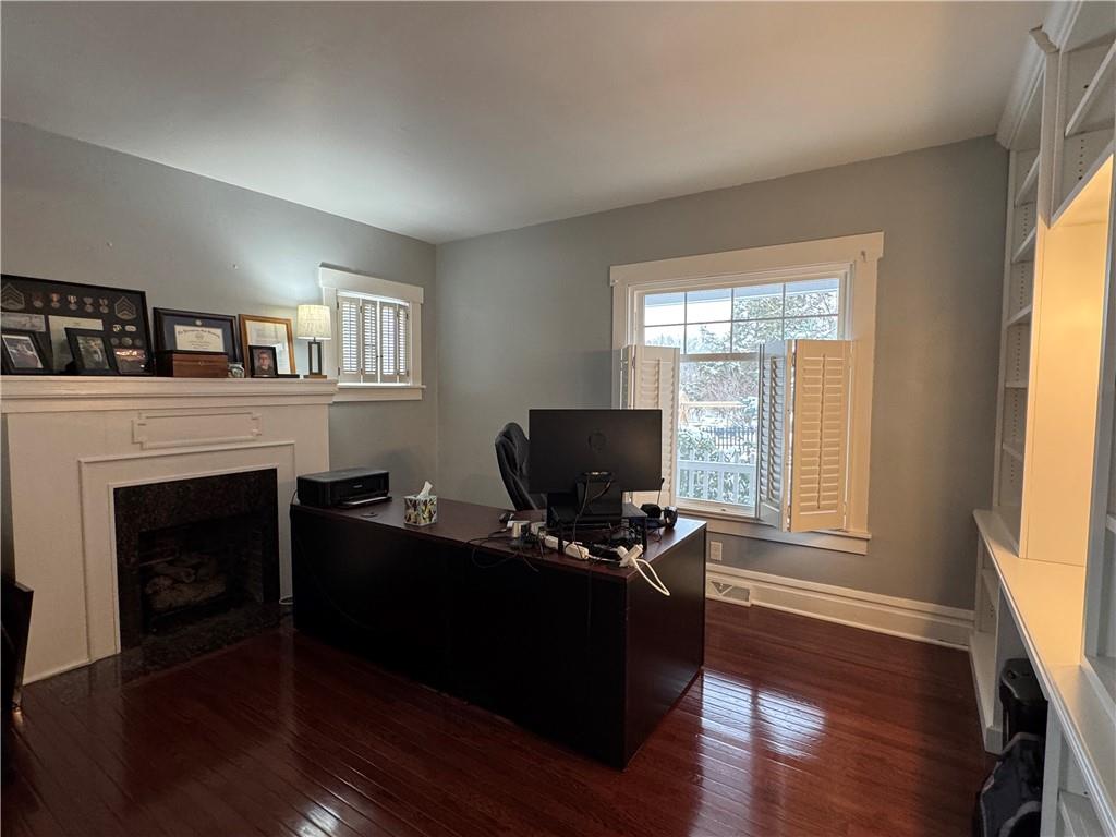 390 Locust Street Indiana, PA 15701 - Photo 4 of 21 a living room with furniture and a fireplace