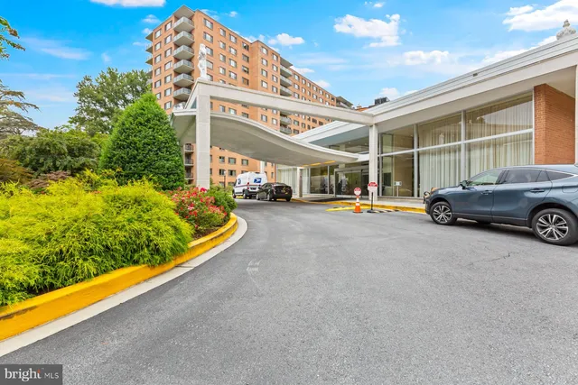 a car parked in front of a building