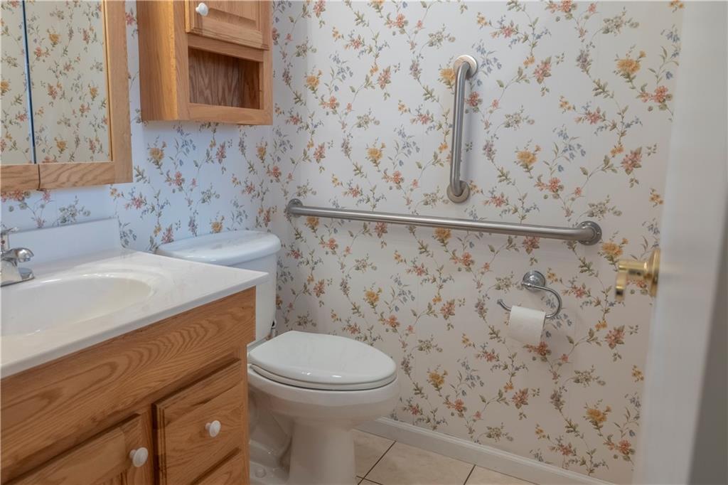 57 Shick Drive Indiana, PA 15701 - Photo 22 of 48 a bathroom with a granite countertop toilet and a sink