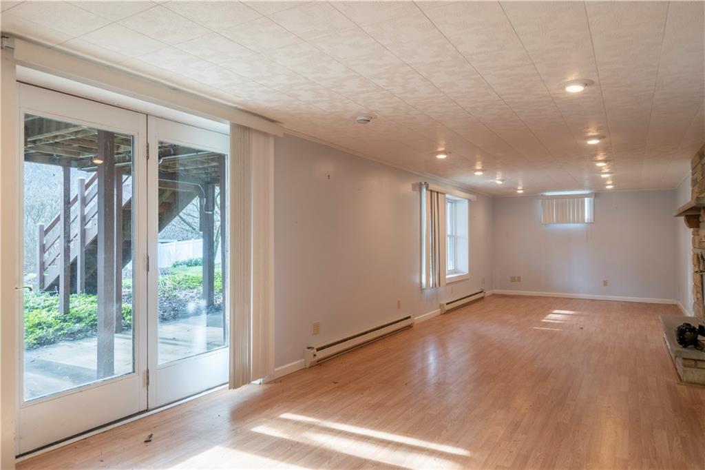 57 Shick Drive Indiana, PA 15701 - Photo 42 of 48 a view of an empty room with wooden floor and a window