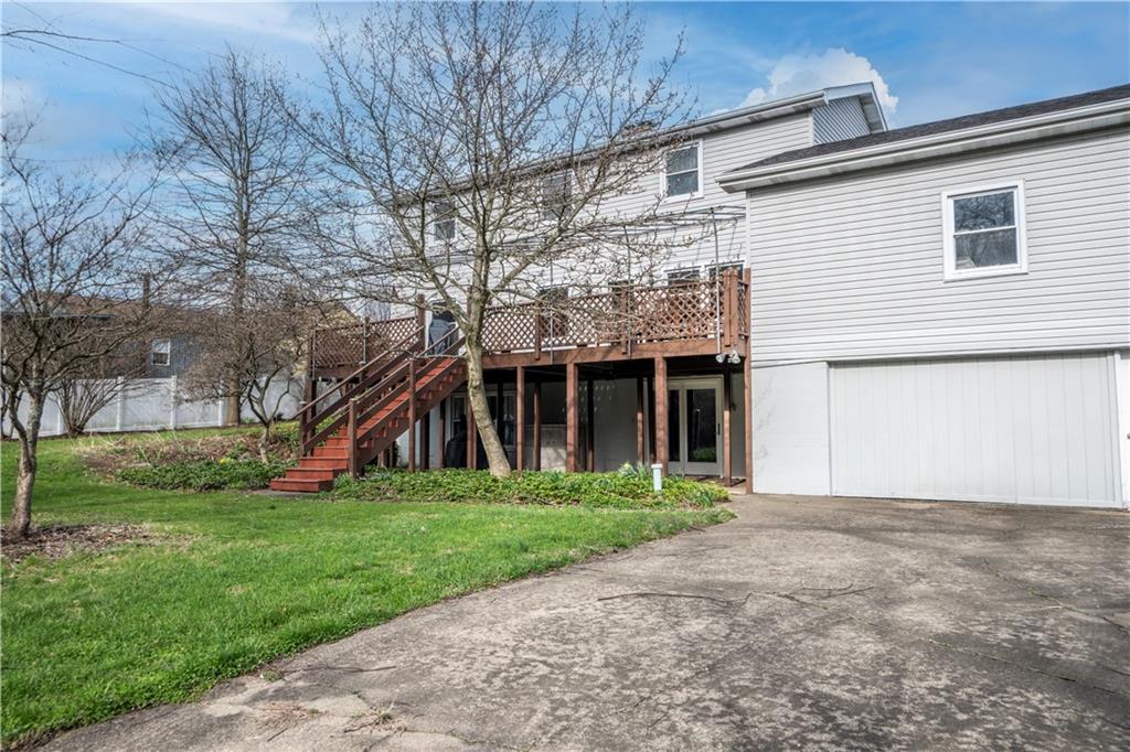 57 Shick Drive Indiana, PA 15701 - Photo 5 of 48 a front view of a house with a yard and trees