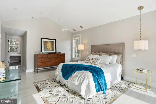 a front view of a house with a yard table and chairs