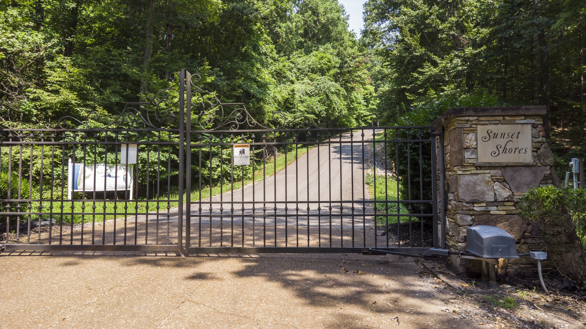 0 Lake Trail Waverly, TN 37185 - Photo 4 of 8 a view of a gate with a fence