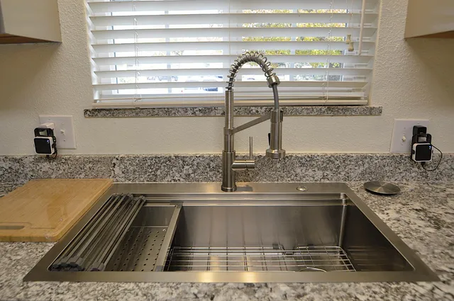 a kitchen with a sink and a stove