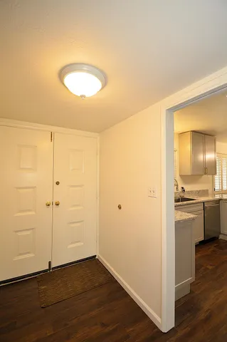 a view of a kitchen cabinets and wooden floor