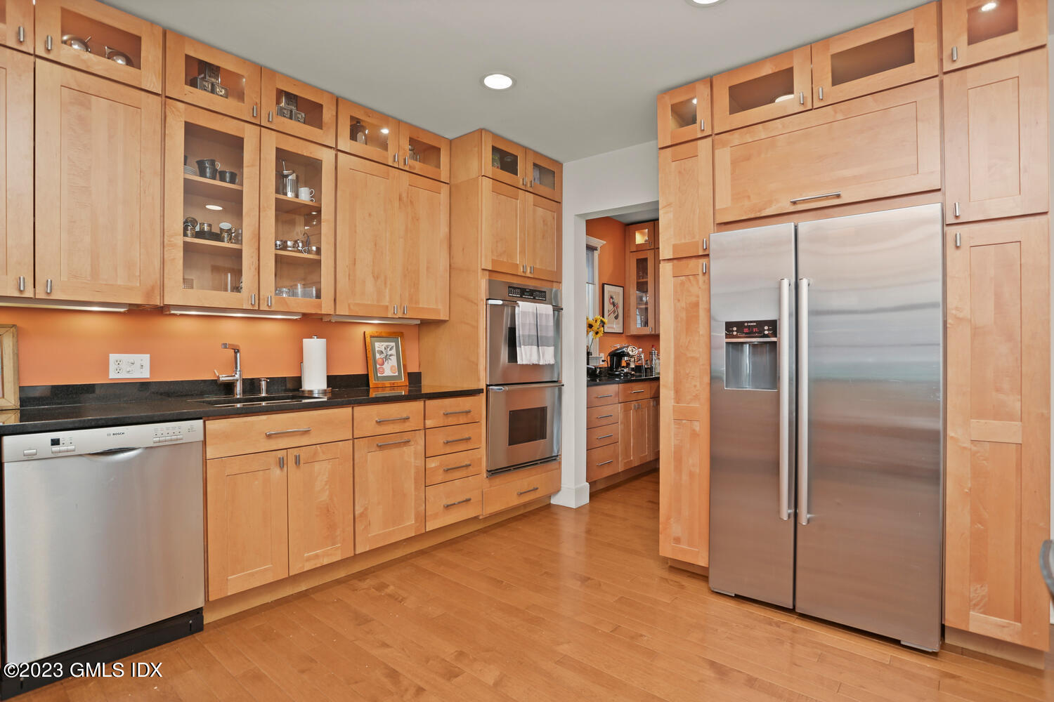 65 Ridge Street Greenwich, CT 06830 - Photo 11 of 35 a kitchen with stainless steel appliances granite countertop a refrigerator and a sink