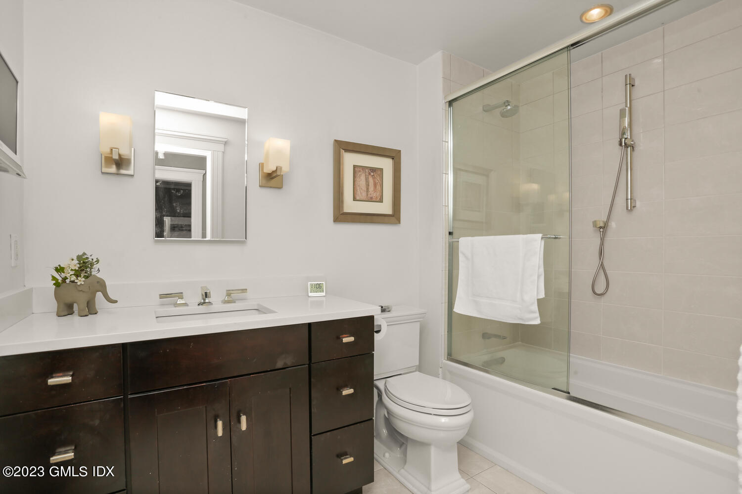 65 Ridge Street Greenwich, CT 06830 - Photo 20 of 35 a bathroom with a sink a toilet and shower