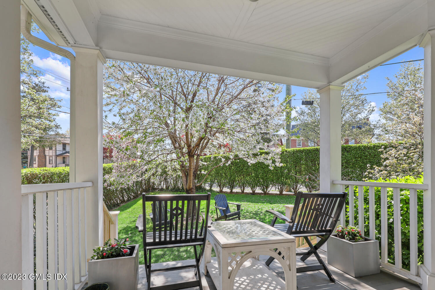 65 Ridge Street Greenwich, CT 06830 - Photo 31 of 35 a view of a two chairs in the deck