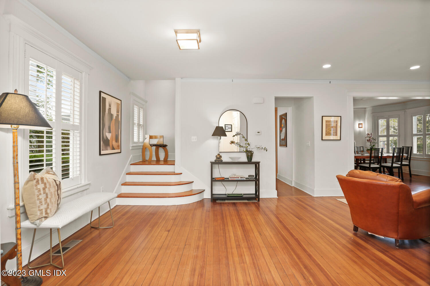 65 Ridge Street Greenwich, CT 06830 - Photo 4 of 35 a living room with furniture and wooden floor