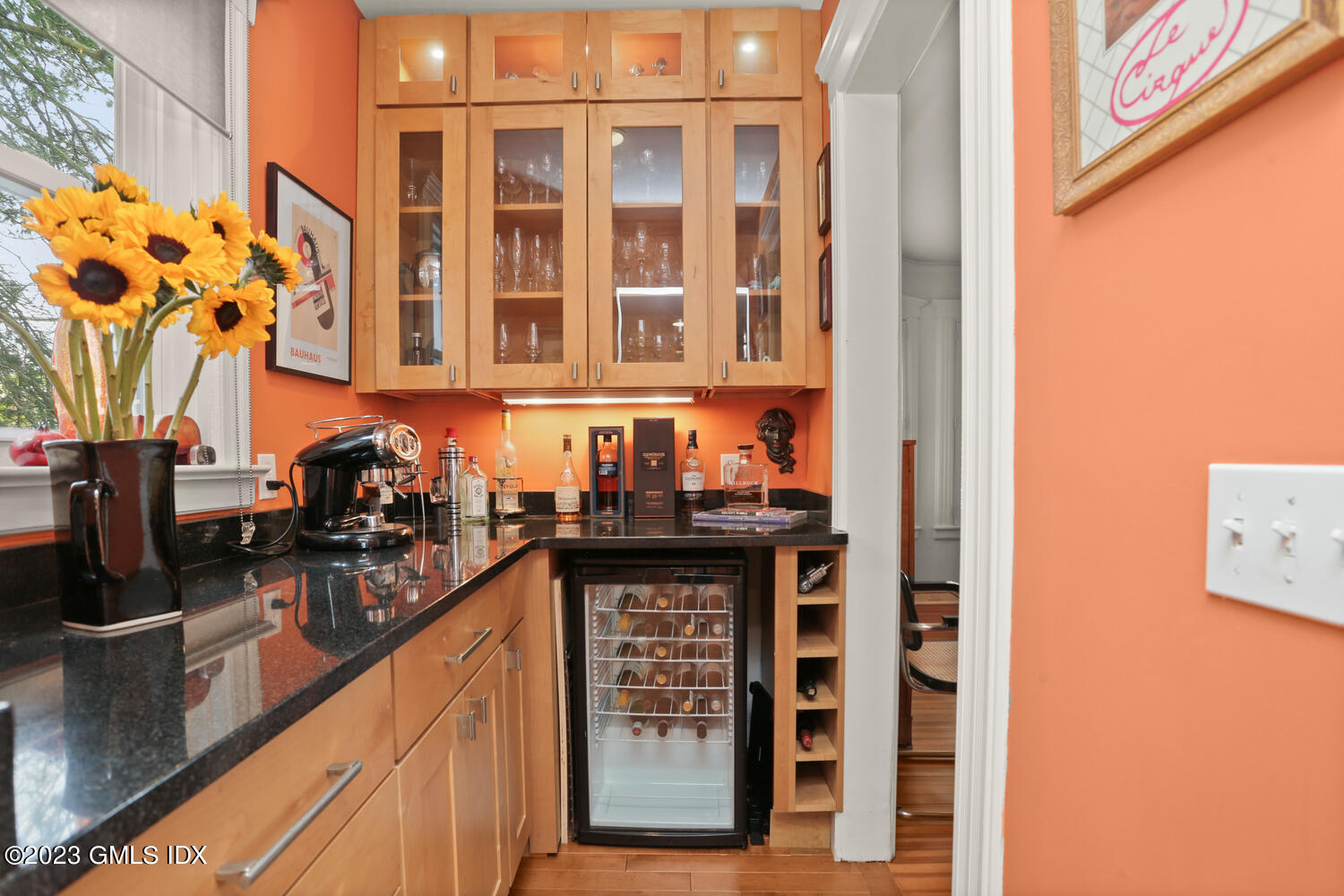 65 Ridge Street Greenwich, CT 06830 - Photo 9 of 35 a kitchen with granite countertop a sink and cabinets
