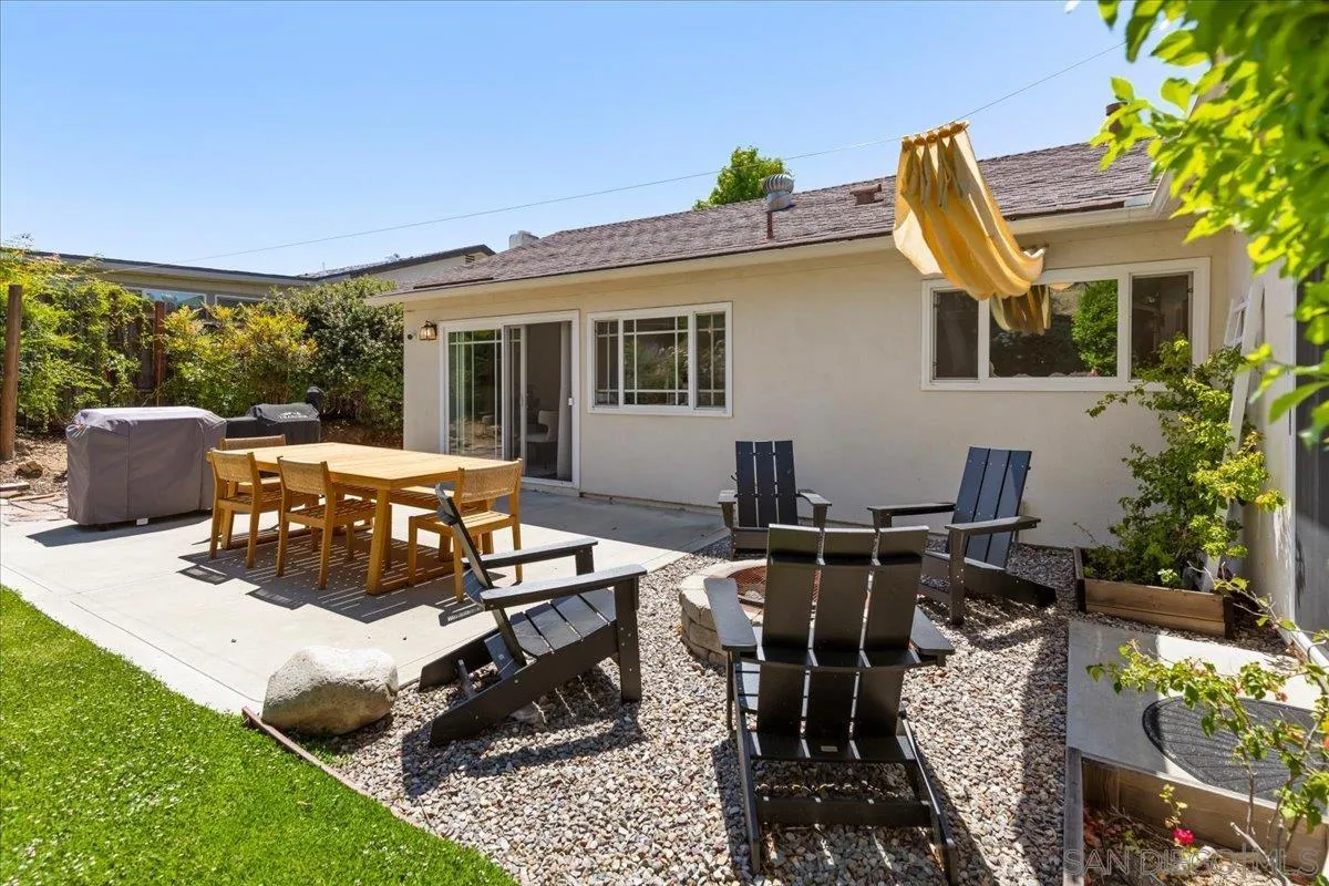 12243 Buckskin Trail Poway, CA 92064 - Photo 20 of 41 a view of a patio with table and chairs and potted plants