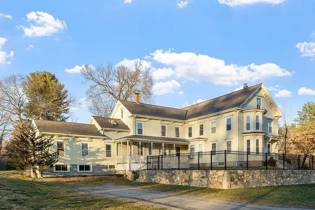 a view of a large white building among the ocean