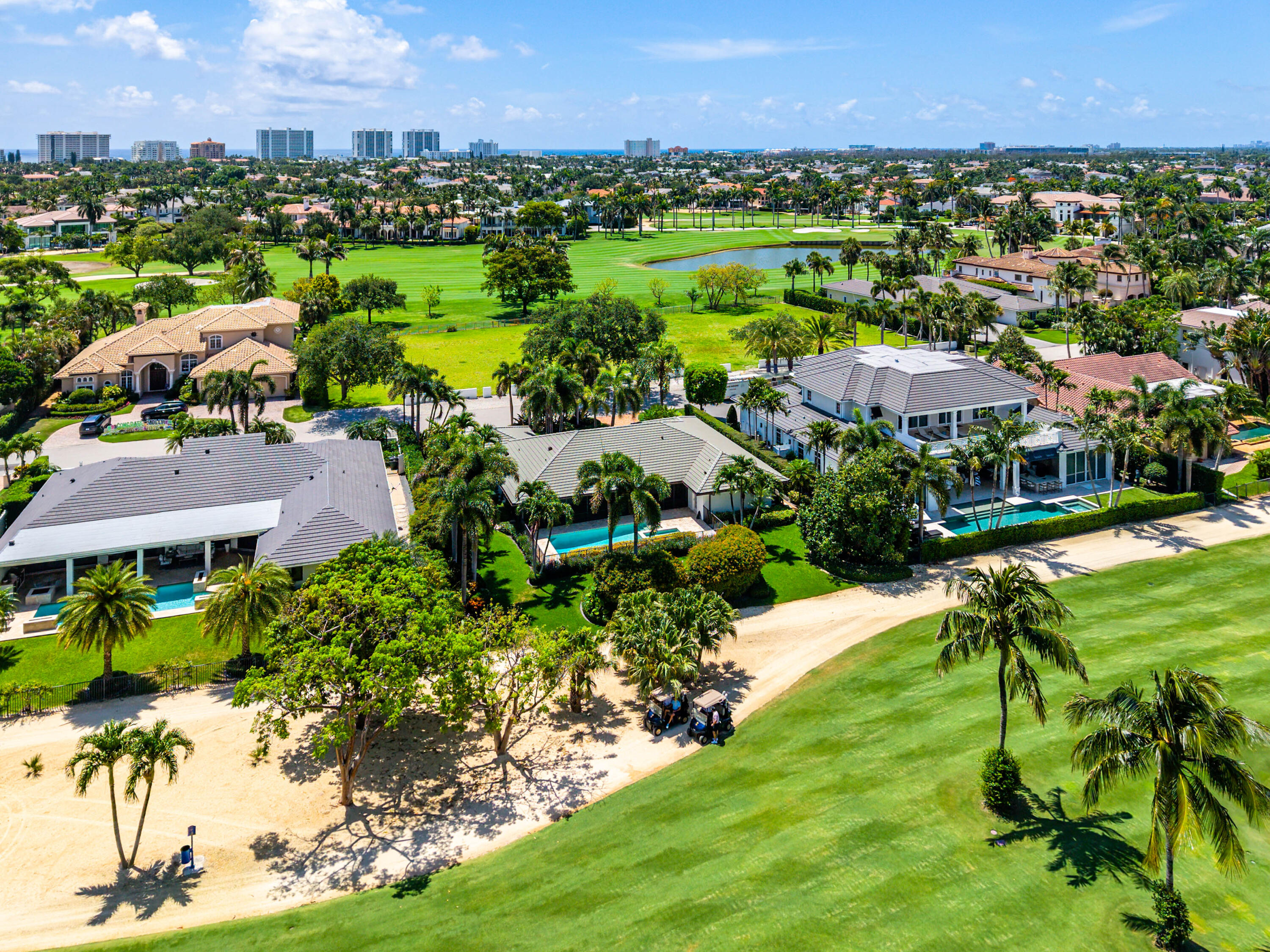 1851 Thatch Palm Drive Boca Raton, FL 33432 - Photo 68 of 70 an aerial view of residential houses with outdoor space and trees