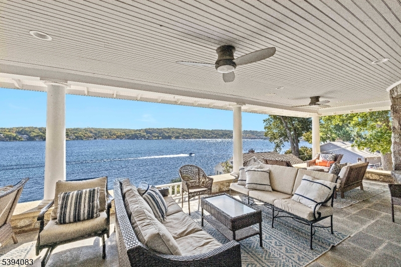 331 Lakeside Boulevard Hopatcong, NJ 07843 - Photo 26 of 34 a outdoor living space with patio furniture and a ceiling fan