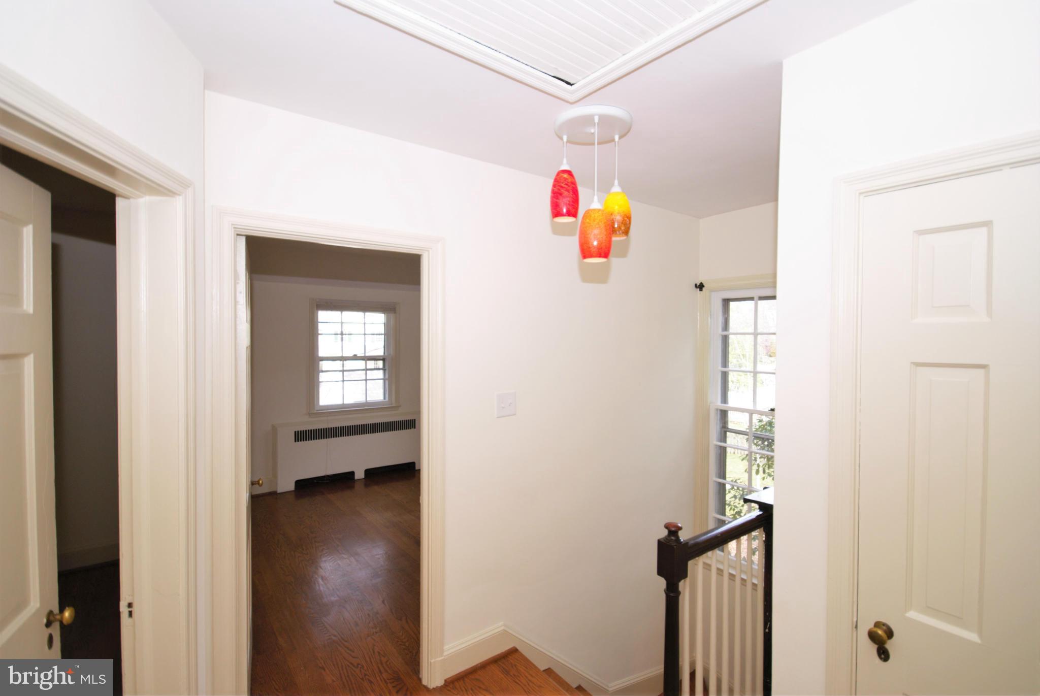 326 Paddington Road Baltimore, MD 21212 - Photo 14 of 29 a view of an entryway with wooden floor