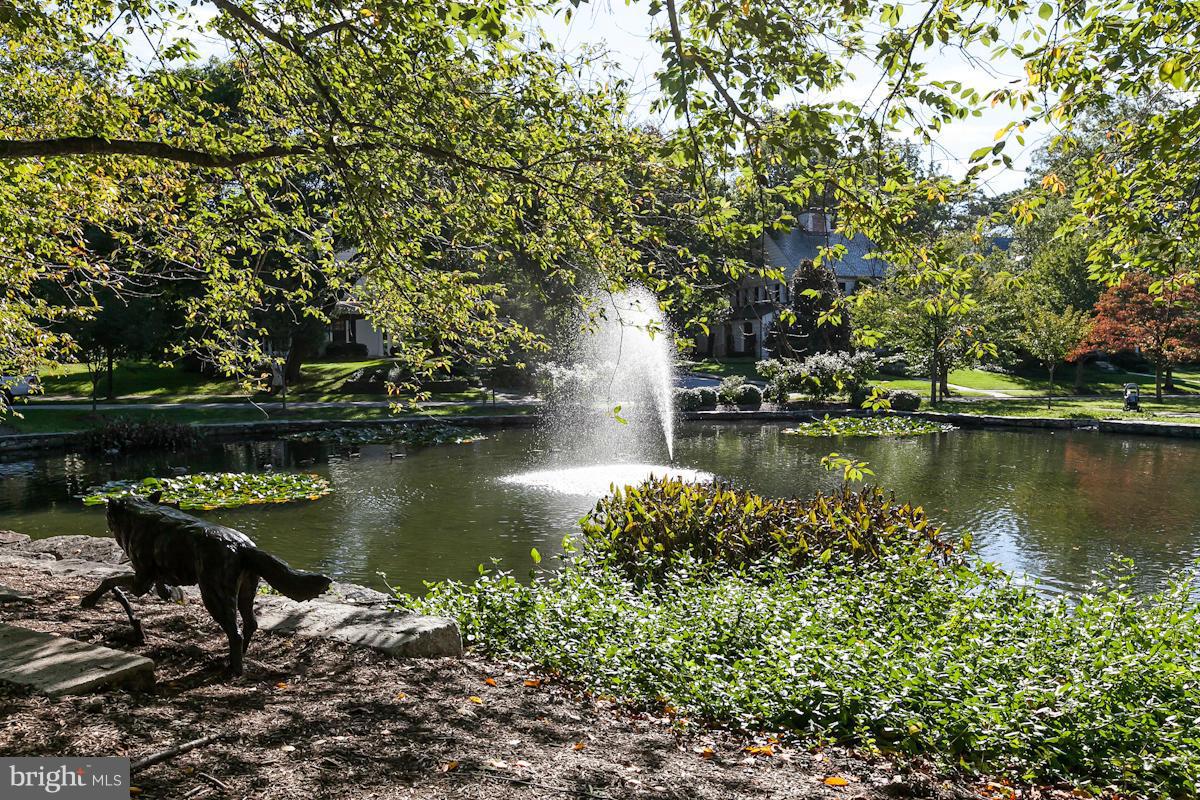 326 Paddington Road Baltimore, MD 21212 - Photo 3 of 29 a view of a lake with a bench