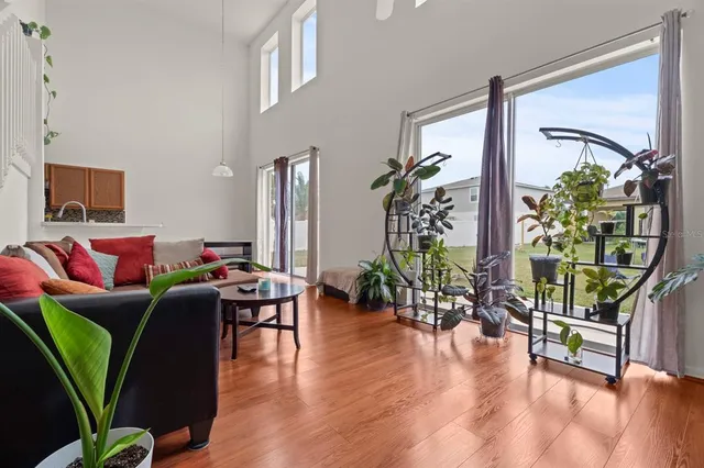 a kitchen with stainless steel appliances granite countertop wooden cabinets stove top oven and sink