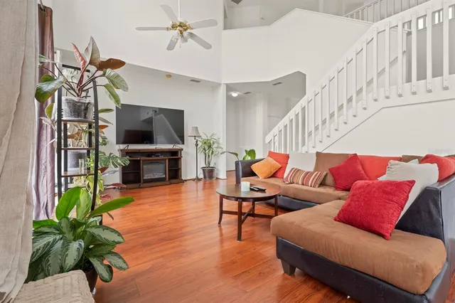a kitchen with a refrigerator sink and cabinets