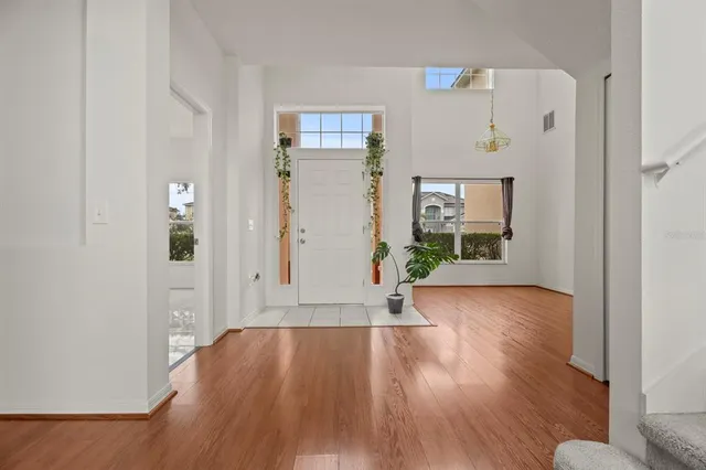 a view of entryway with wooden floor