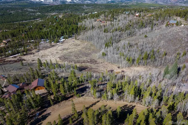 a view of a lake with lots of trees