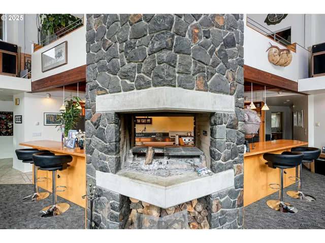 a view of a chairs and table in a patio