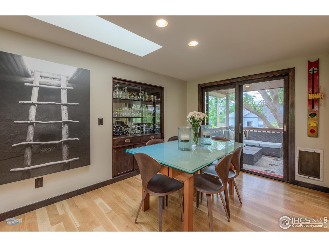 2850 Emerson Avenue Boulder, CO 80305 - Photo 14 of 40 a view of a dining room with furniture and wooden floor