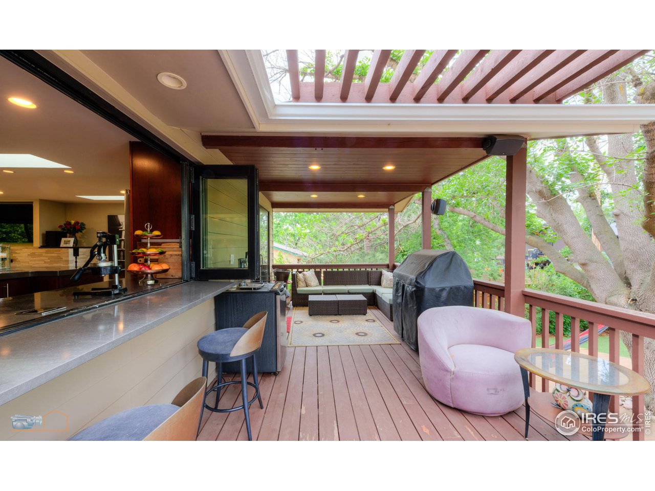2850 Emerson Avenue Boulder, CO 80305 - Photo 28 of 40 a living room with furniture and a large window