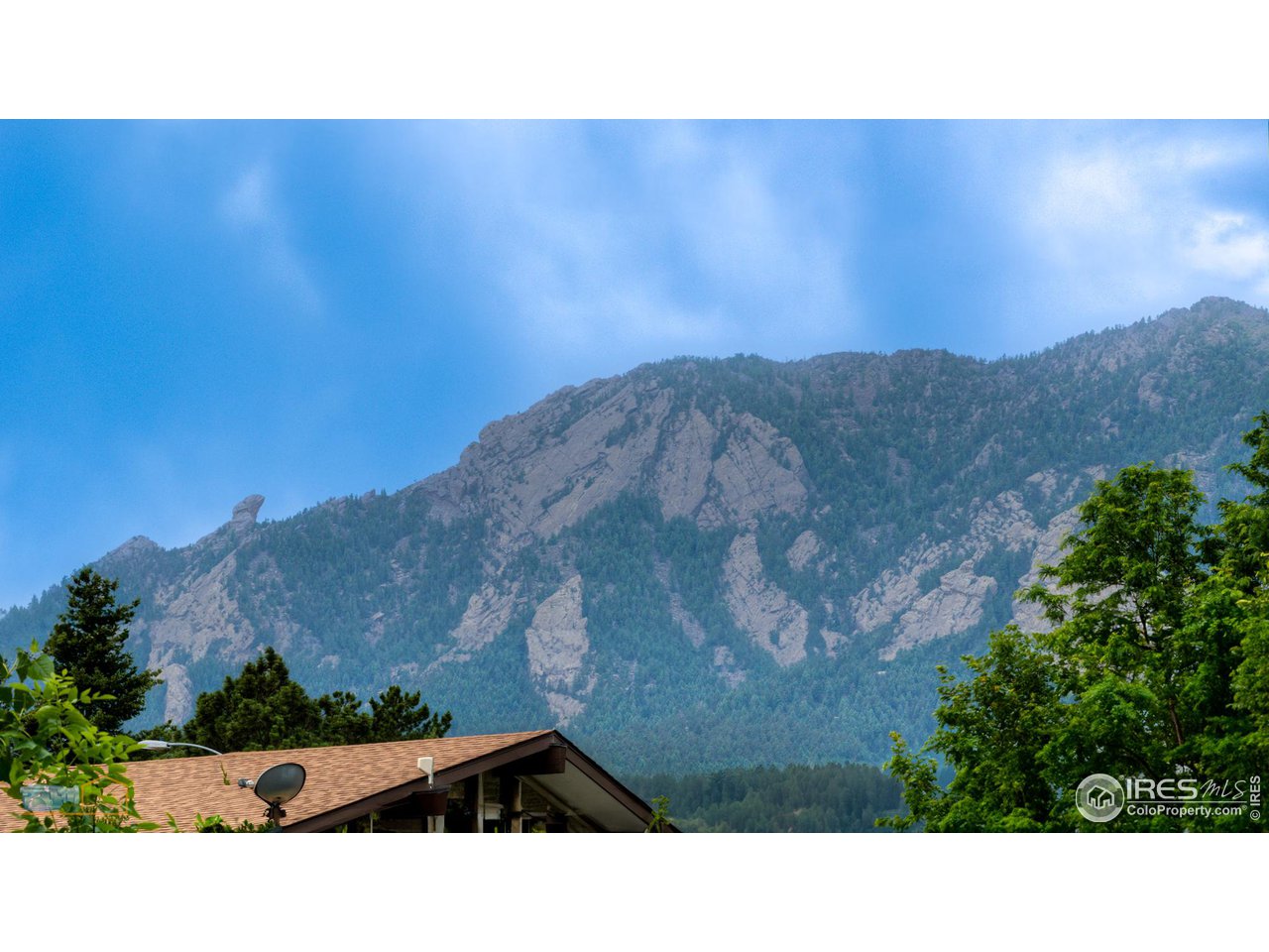 2850 Emerson Avenue Boulder, CO 80305 - Photo 3 of 40 a black and white photo of a building