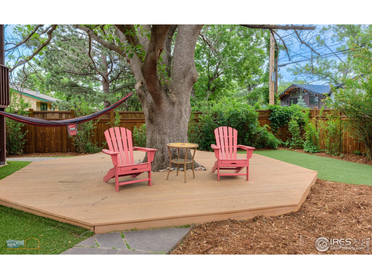 2850 Emerson Avenue Boulder, CO 80305 - Photo 31 of 40 a wooden bench sitting in the middle of a park