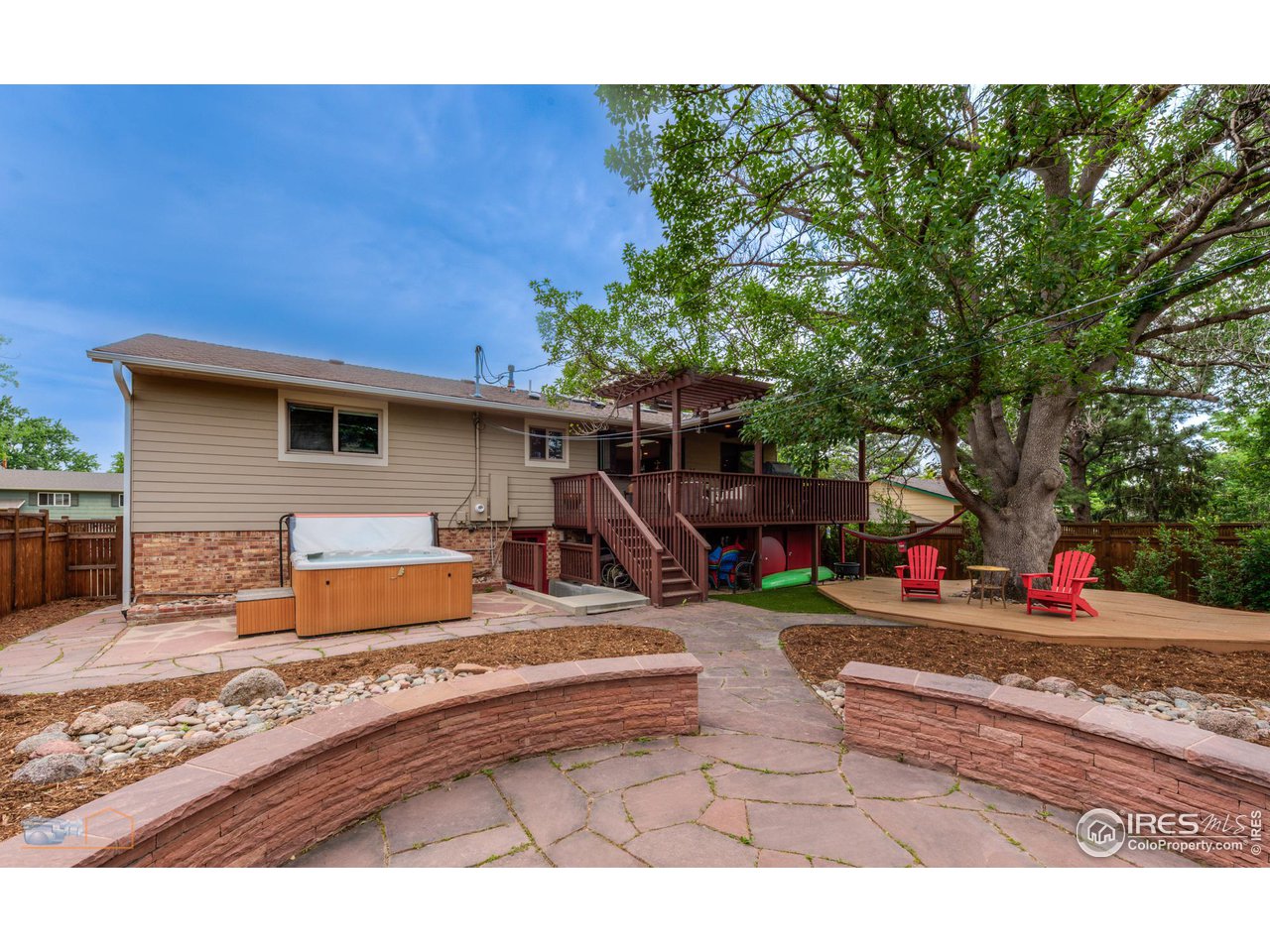 2850 Emerson Avenue Boulder, CO 80305 - Photo 34 of 40 a view of a house with backyard and sitting area