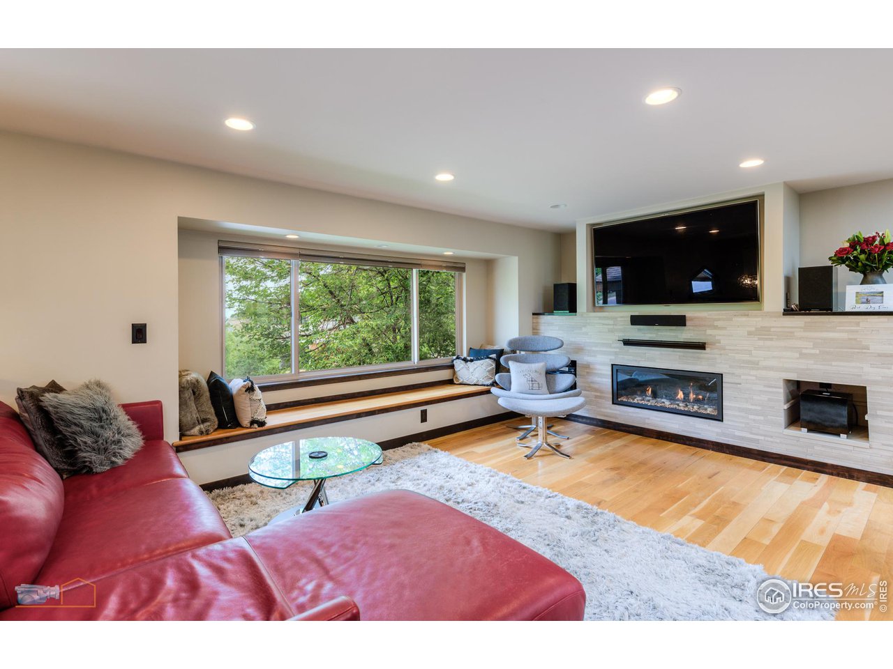 2850 Emerson Avenue Boulder, CO 80305 - Photo 7 of 40 a living room with furniture pool table and a flat screen tv