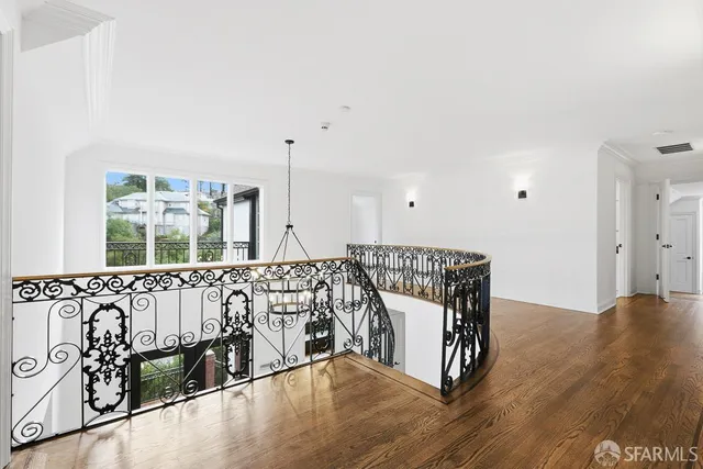 a bedroom with a bed and a view of bathroom