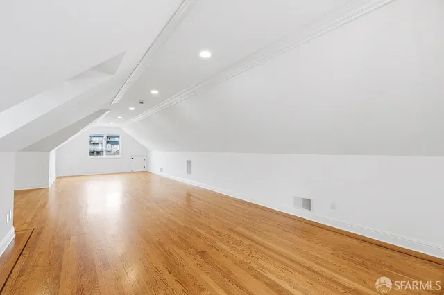 a stove top oven sitting inside of a kitchen