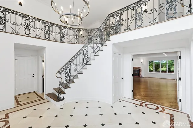 a kitchen with stainless steel appliances granite countertop a stove and cabinets
